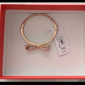 Kate Spade bow bangle. Tag attached, never used, comes with dust bag and box